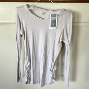 Athleta shine speed light top new with tags never worn.